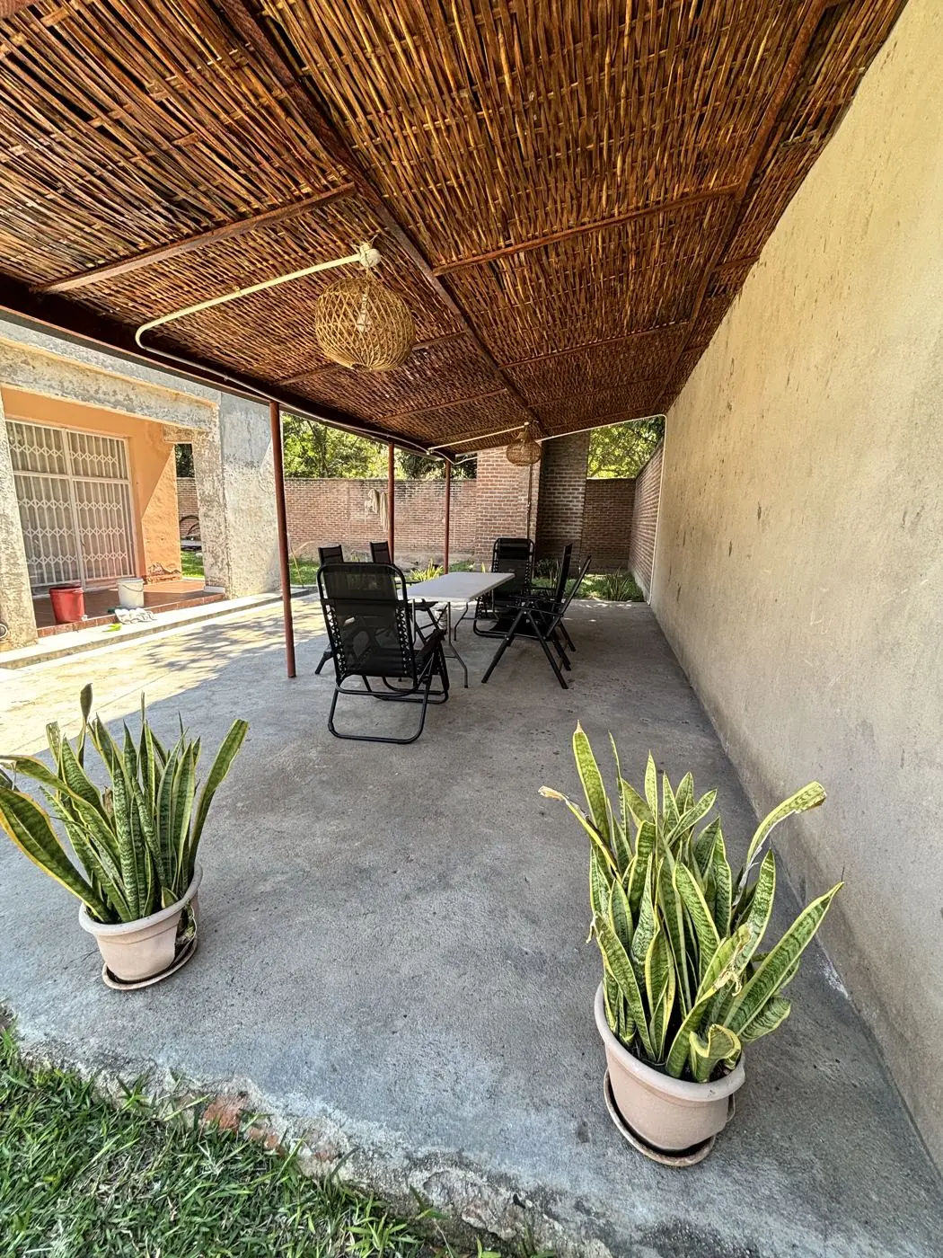 Covered patio with reed ceiling