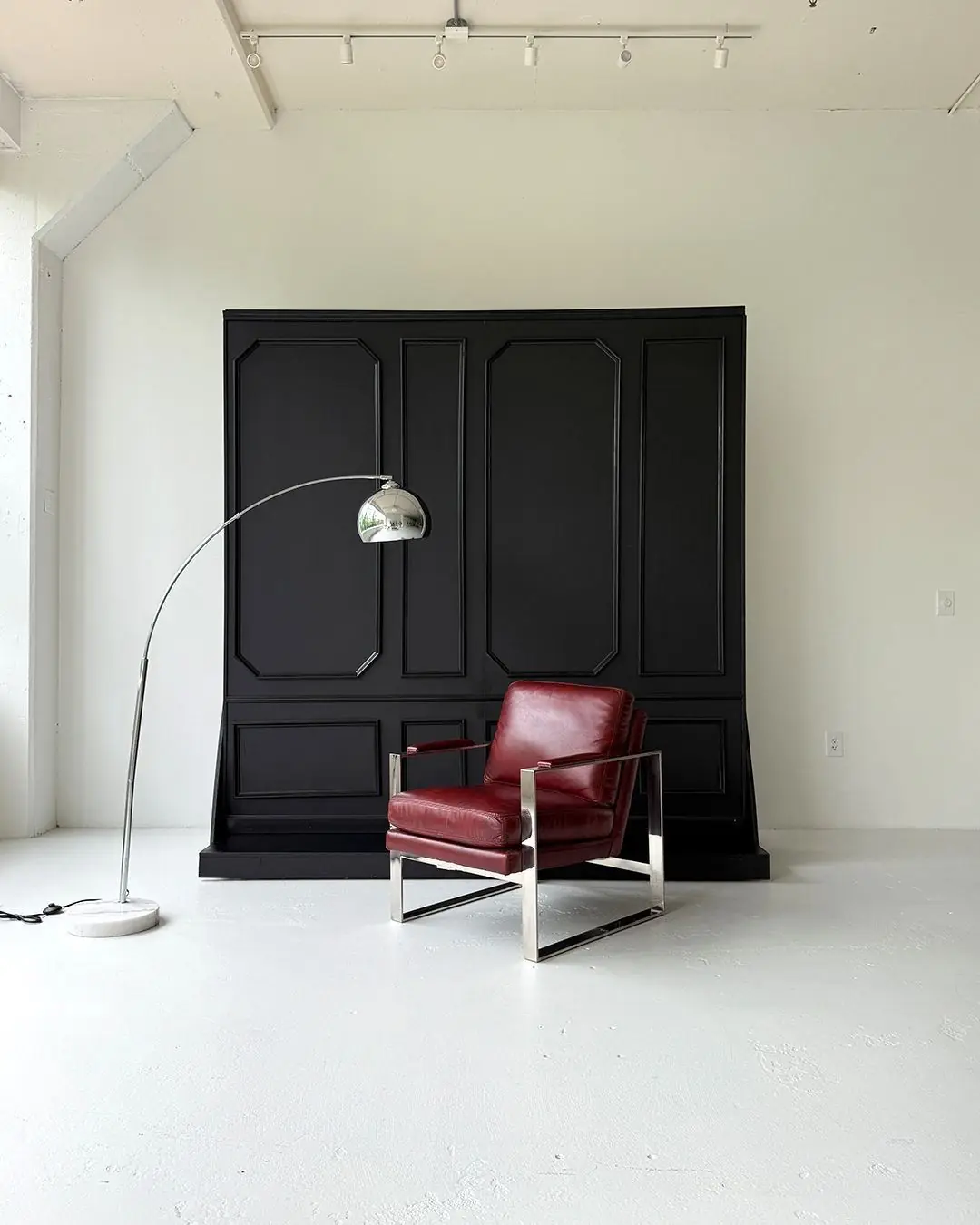 Black panelled feature wall